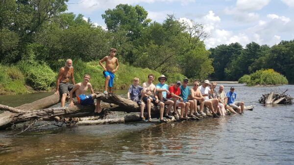 Group of men enjoying a river day